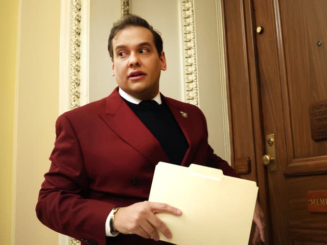 <p>U.S. Rep. George Santos (R-NY) walks into the House Republican cloakroom at the U.S. Capitol on 28 November 2023 in Washington, DC. Santos spoke to reporters about his ethics report and his upcoming expulsion vote.</p>