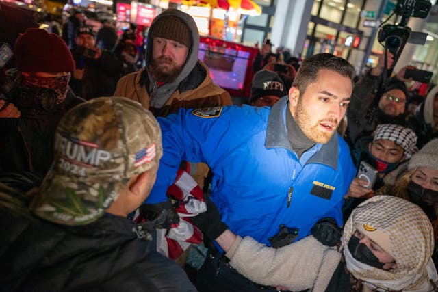 Protesters Rockefeller Tree Pro-Palestinian protesters disrupt NYC’s Rockefeller Christmas tree ...