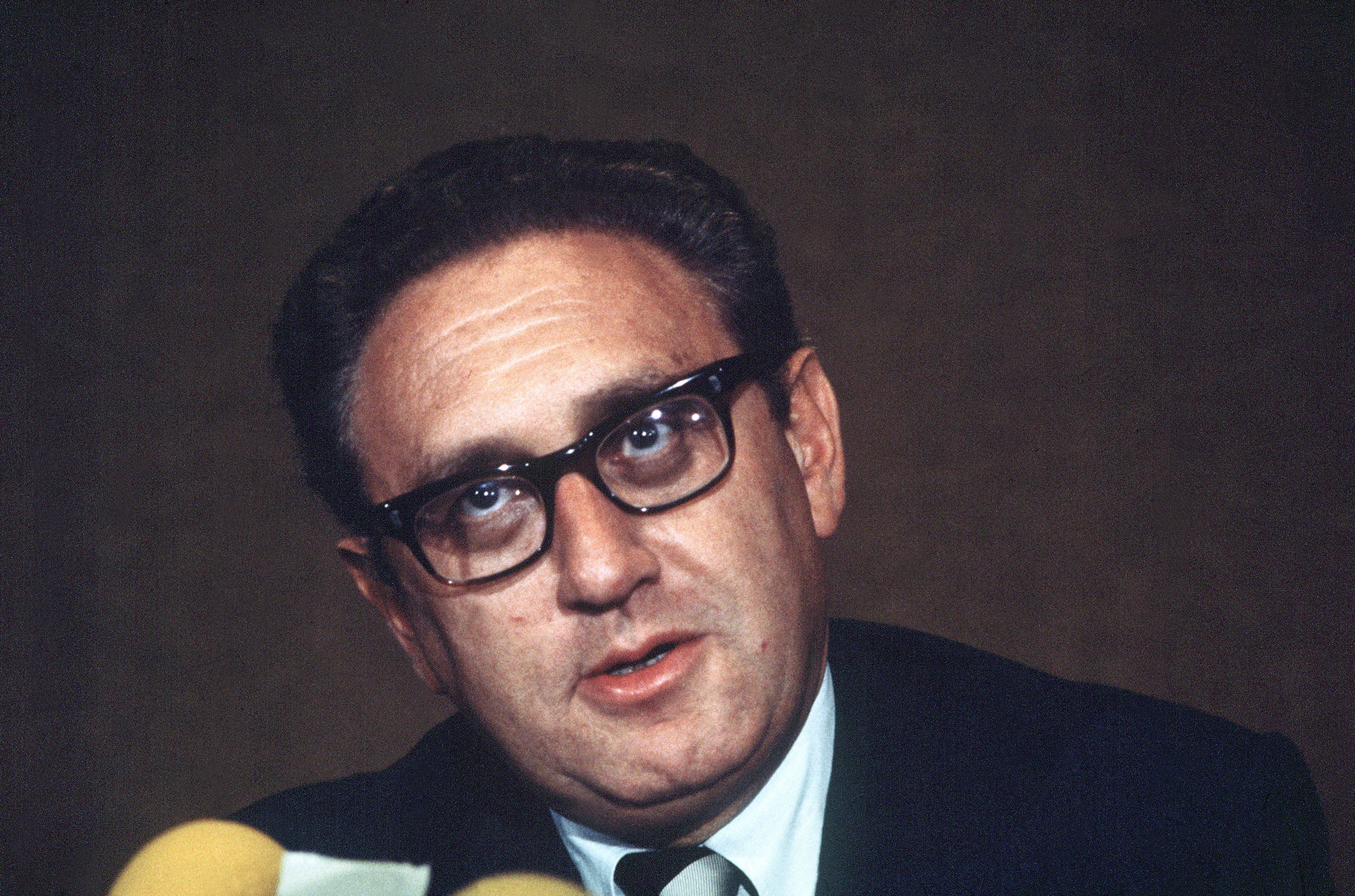 US National Security Advisor Henry Kissinger speaks to the press in Paris