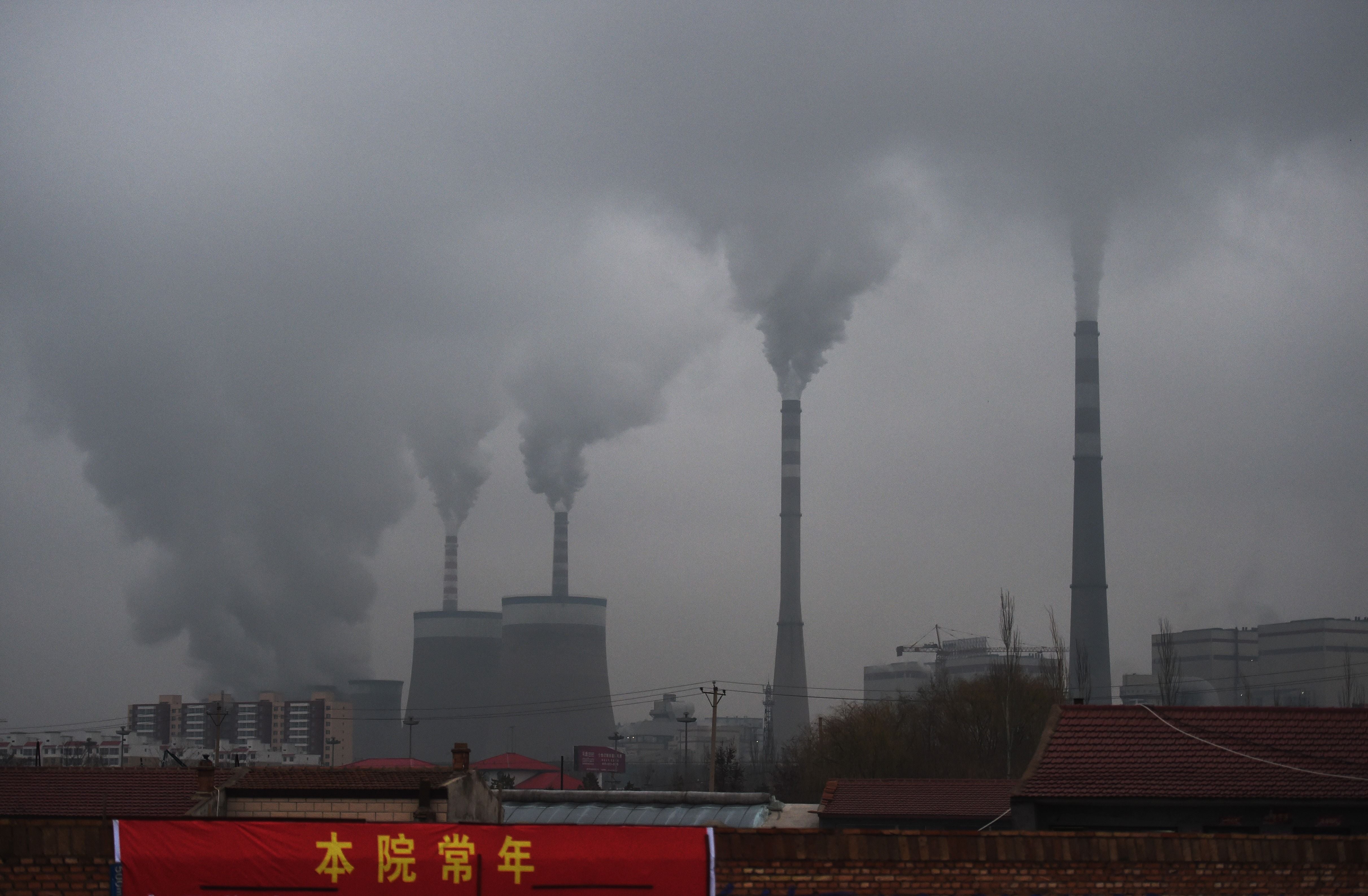 Smoke belching from a coal-fueled power station near Datong, in China