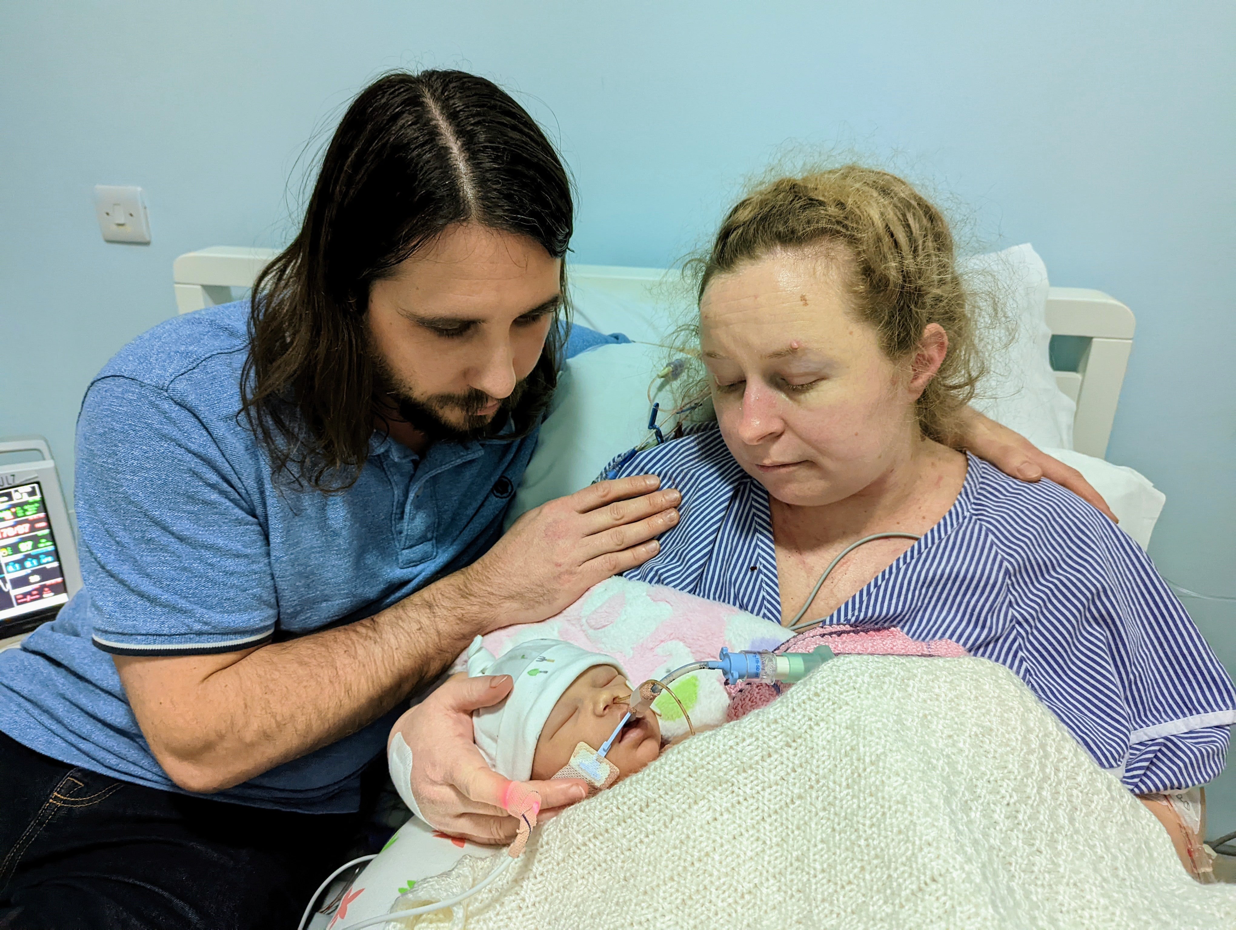 Robert Miller and Katie Fowler saying goodbye to their daughter Abigail