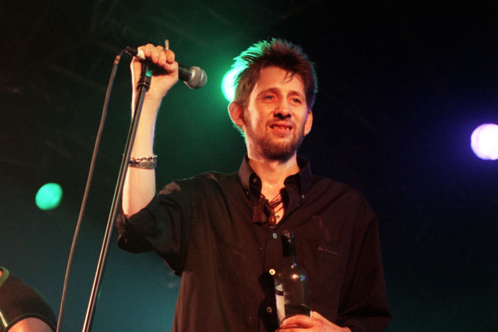 Centre stage: the frontman performing with The Pogues