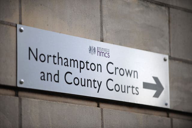 A sign pointing the way to Northampton Crown and County Courts (Tony Marshall/PA)