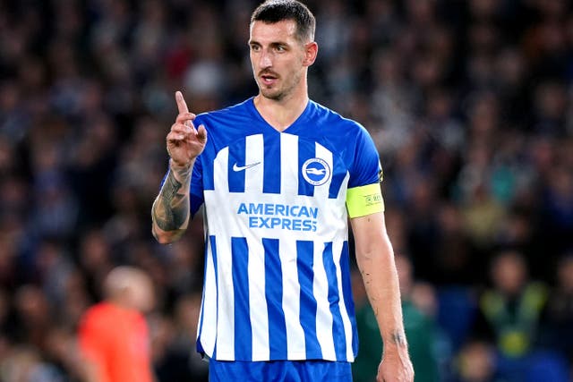 Lewis Dunk hailed a historic day for Brighton (Gareth Fuller/PA)