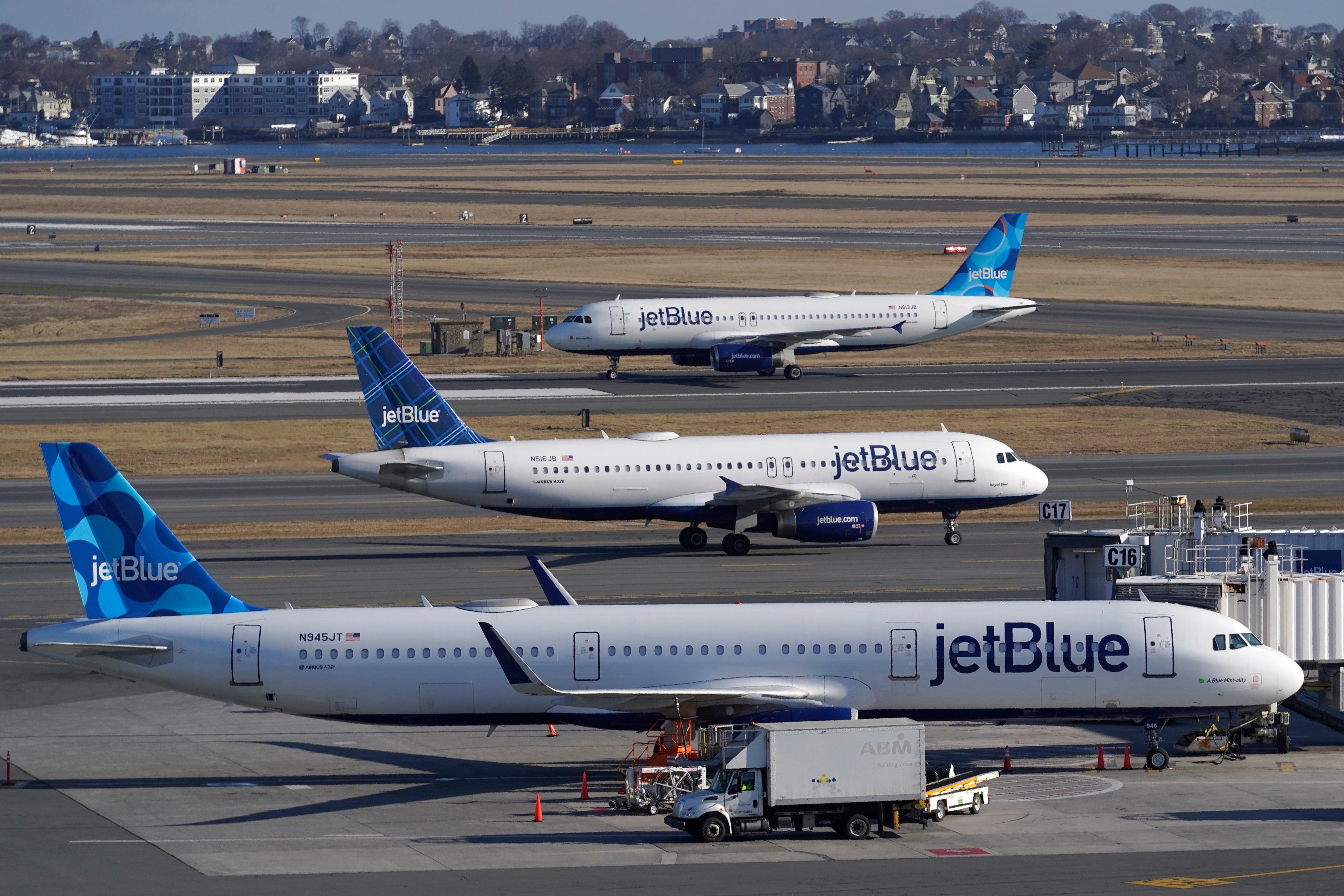 FILE - Passenger jets on the tarmac at Logan International Airport, 11 January 2023, in Boston. (AP Photo/Steven Senne, File)