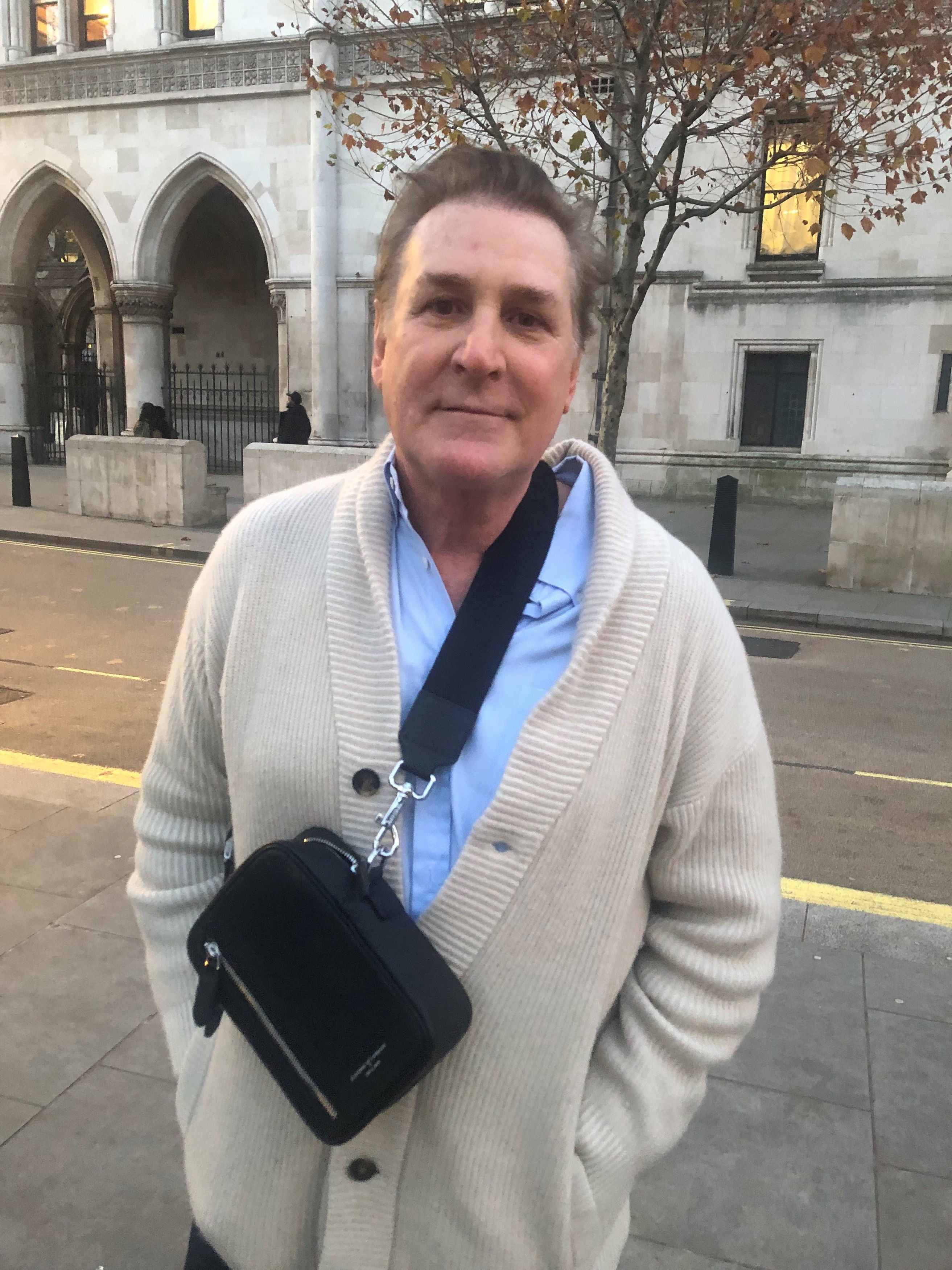 American financier Eric Hersman outside the Royal Courts of Justice in central London