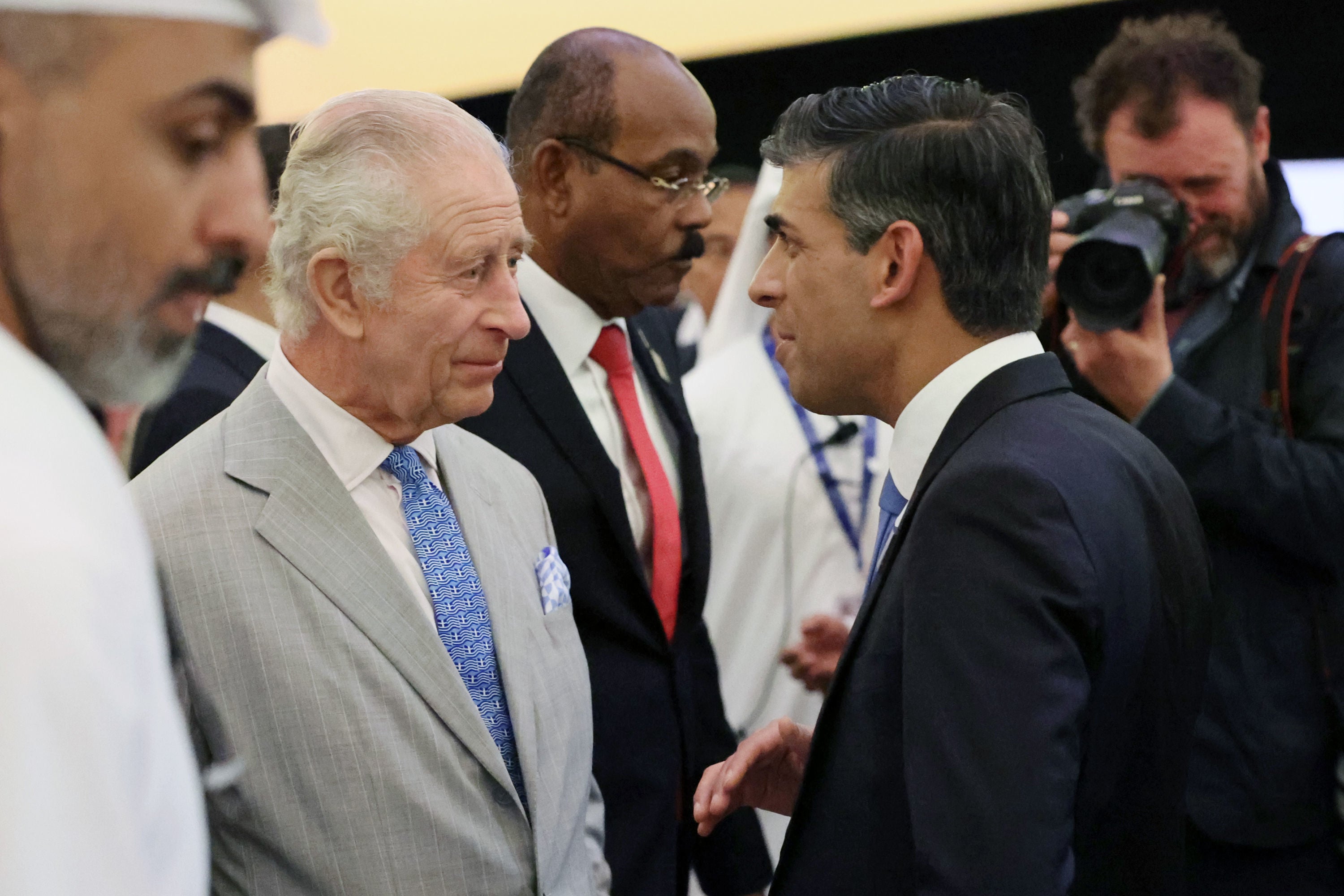 King Charles III (left) speaks with prime minister Rishi Sunak as they attend the opening ceremony of the World Climate Action Summit