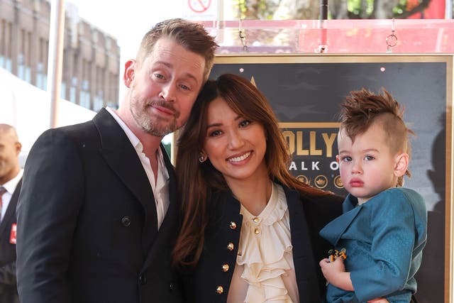 <p>Macaulay Culkin, Brenda Song and Dakota Song Culkin attend the ceremony honoring Macaulay Culkin with a Star on the Hollywood Walk of Fame on 1 December 2023 in Hollywood, California.</p>
