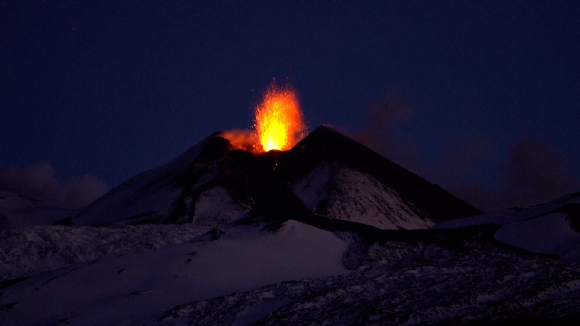 <p>Stunning footage shows Mount Etna volcano eruption inside snow-capped crater</p>