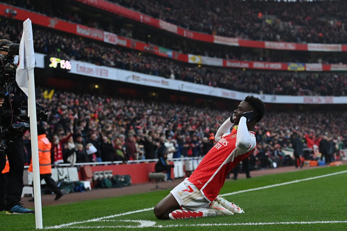 Bukayo Saka and Martin Odegaard fire Arsenal four points clear at the top of the Premier League