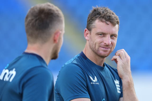 <p>Jos Buttler (R) and Sam Curran (L) of England chat during a nets session</p>