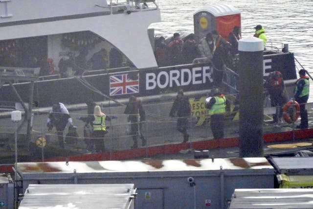 A group of people thought to be migrants are brought in to Dover, Kent, during freezing conditions on Saturday (Gareth Fuller/PA)