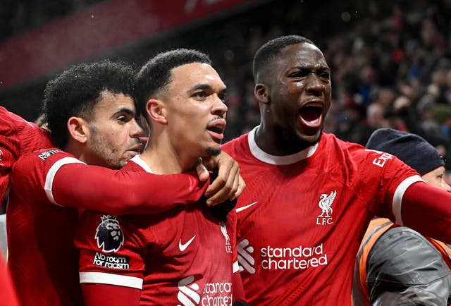 <p>Trent Alexander-Arnold (centre) celebrates scoring Liverpool’s fourth goal in the 4-3 win over Fulham at Anfield </p>