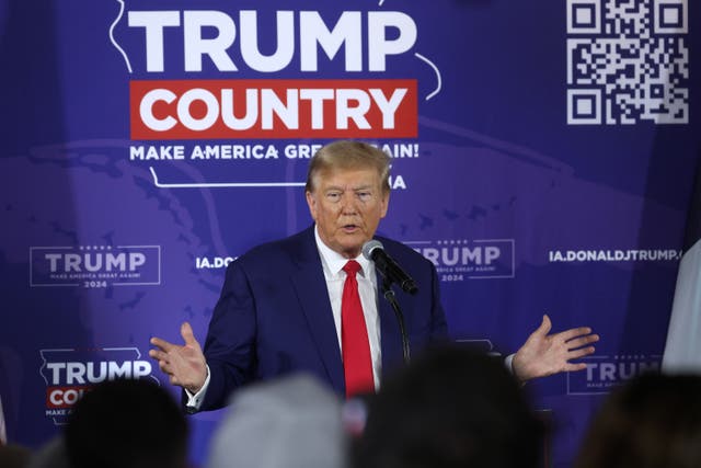 <p>Republican presidential candidate former President Donald Trump speaks at a commit to caucus campaign event at the Whiskey River bar on 2 December 2023</p>