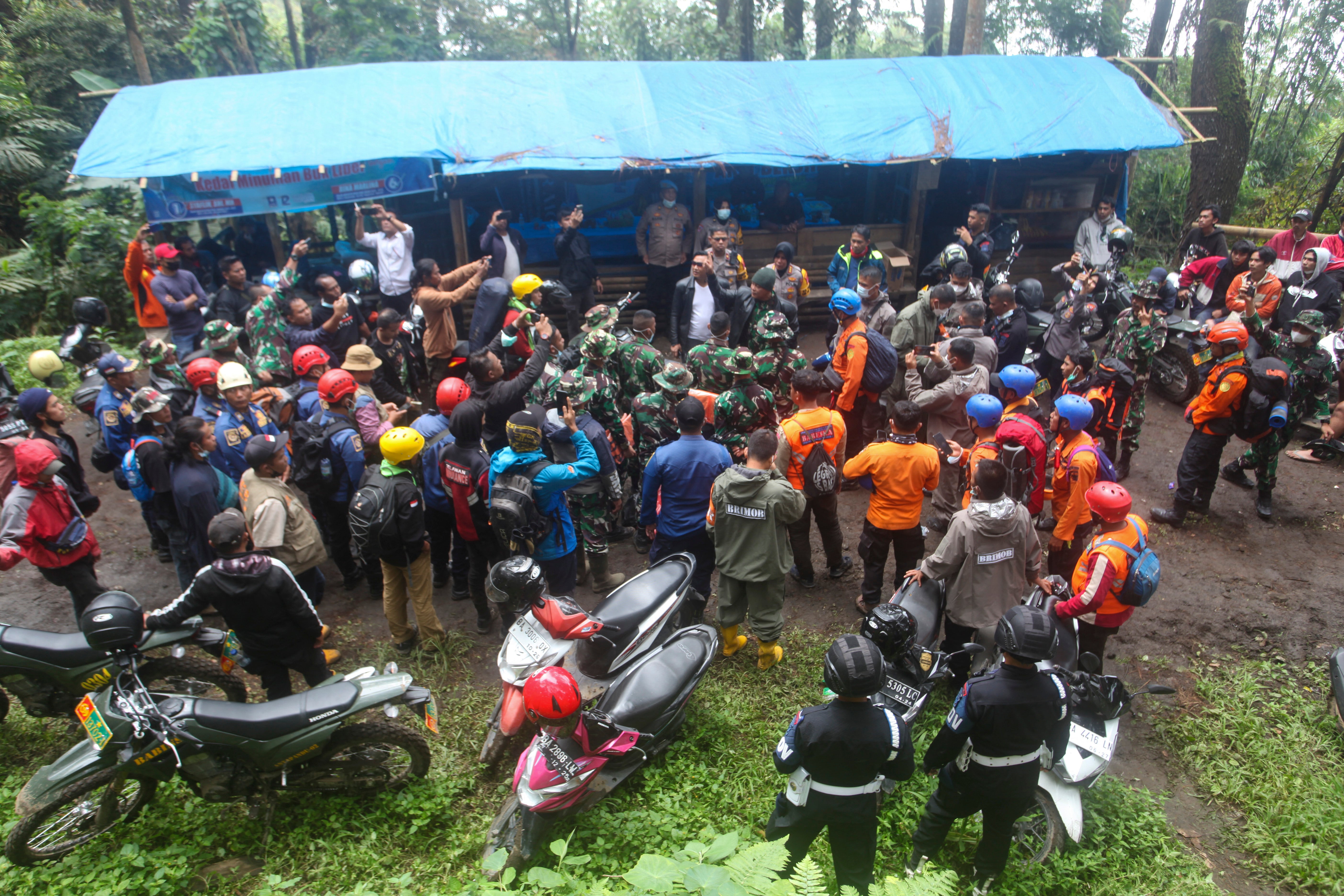 Rescuers prepare for a search and rescue operation after Mount Marapi erupted, on Monday