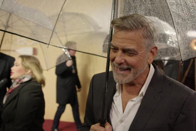 <p>George Clooney jokes about his age as he braves rain for The Boys in the Boat London premiere.</p>
