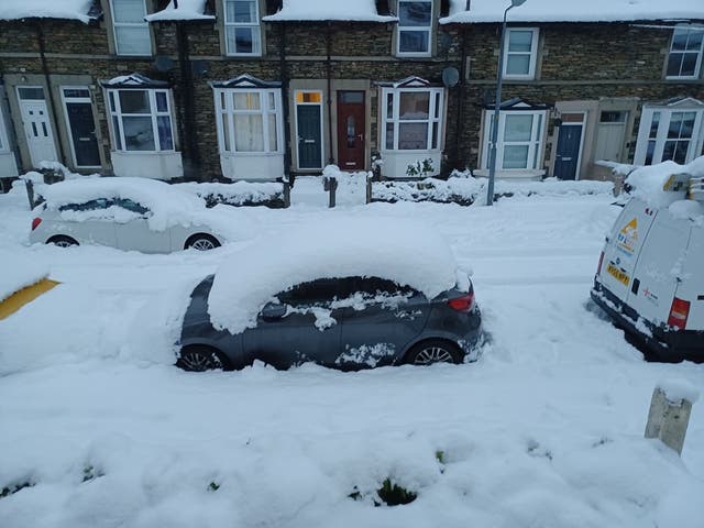 <p>A snow-covered street in Cumbria, UK</p>