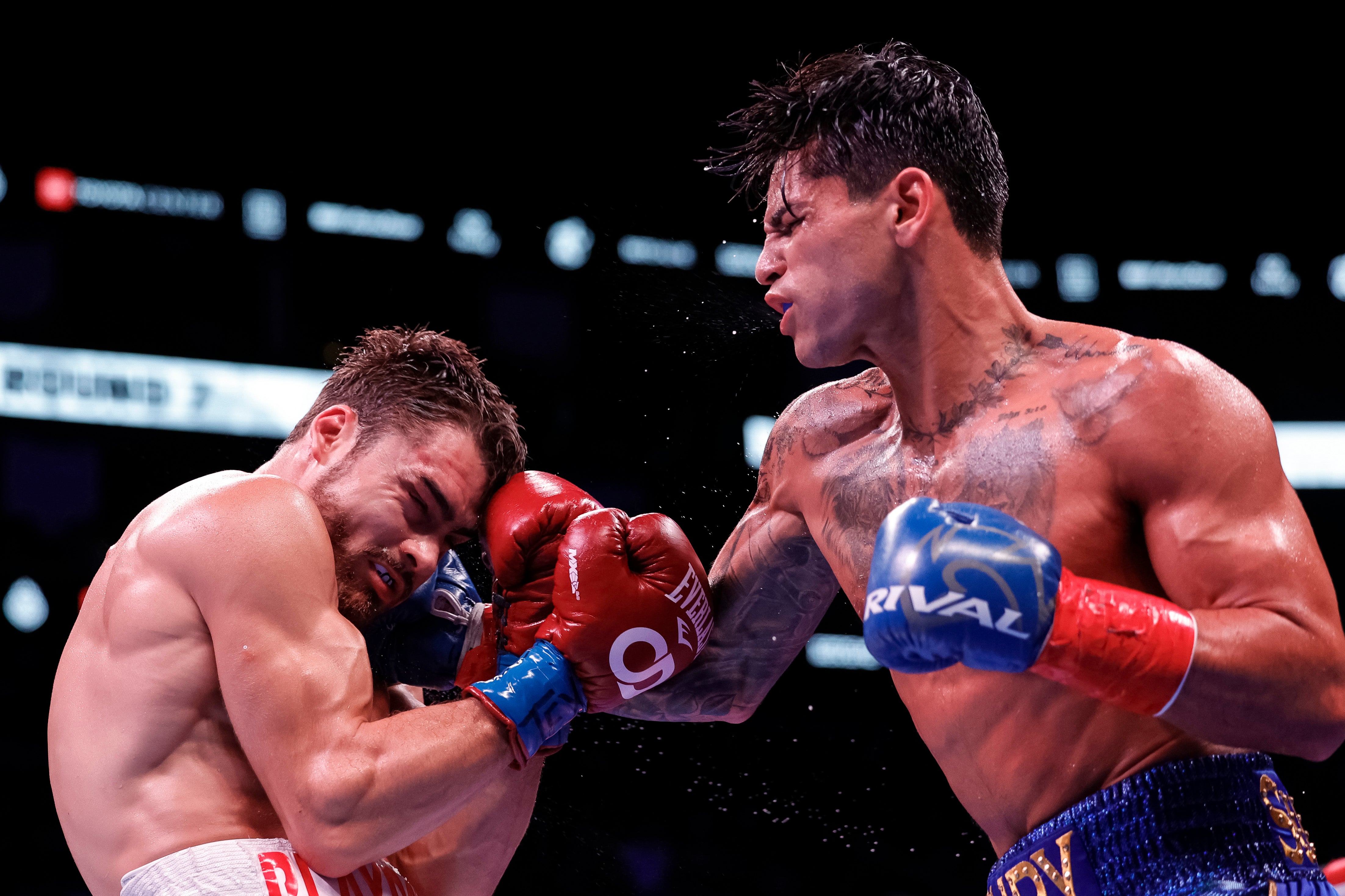 Garcia, right, secured an eighth-round TKO against Oscar Duarte