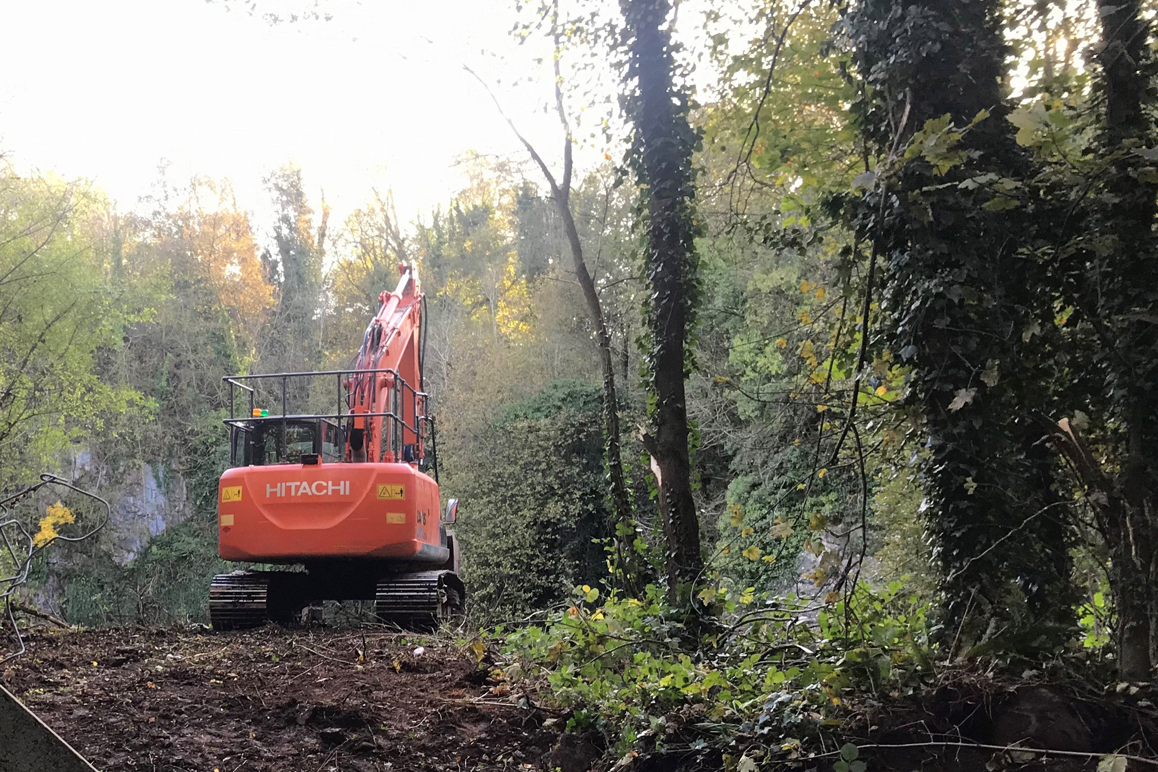 An excavator at a quarry in Co Tyrone during a search for Charlotte Murray (PA)