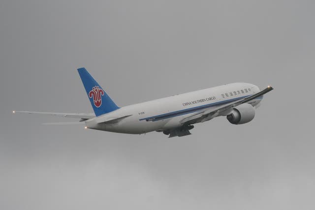 The China Southern cargo plane carrying Giant pandas Yang Guang and Tian Tian takes off from Edinburgh Airport (Jane Barlow/PA)