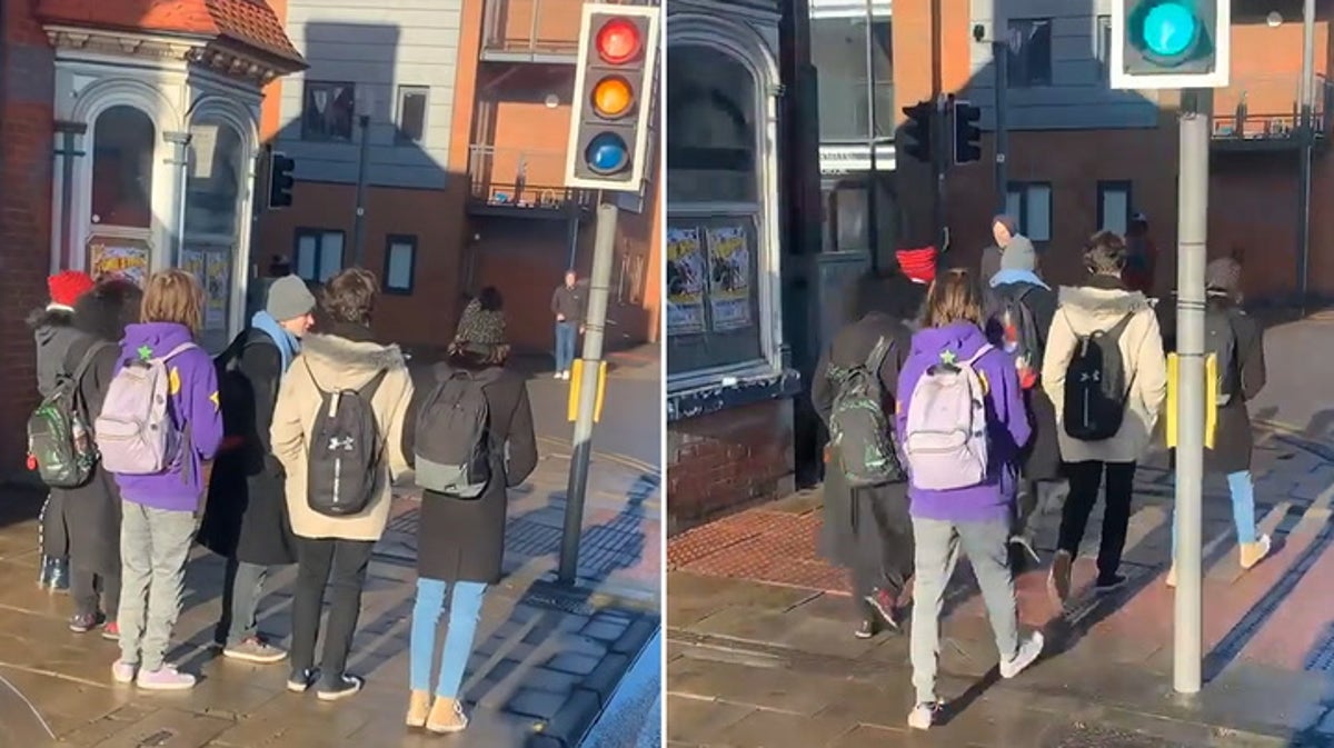Watch: American tourists mistakenly think red traffic lights are for pedestrians