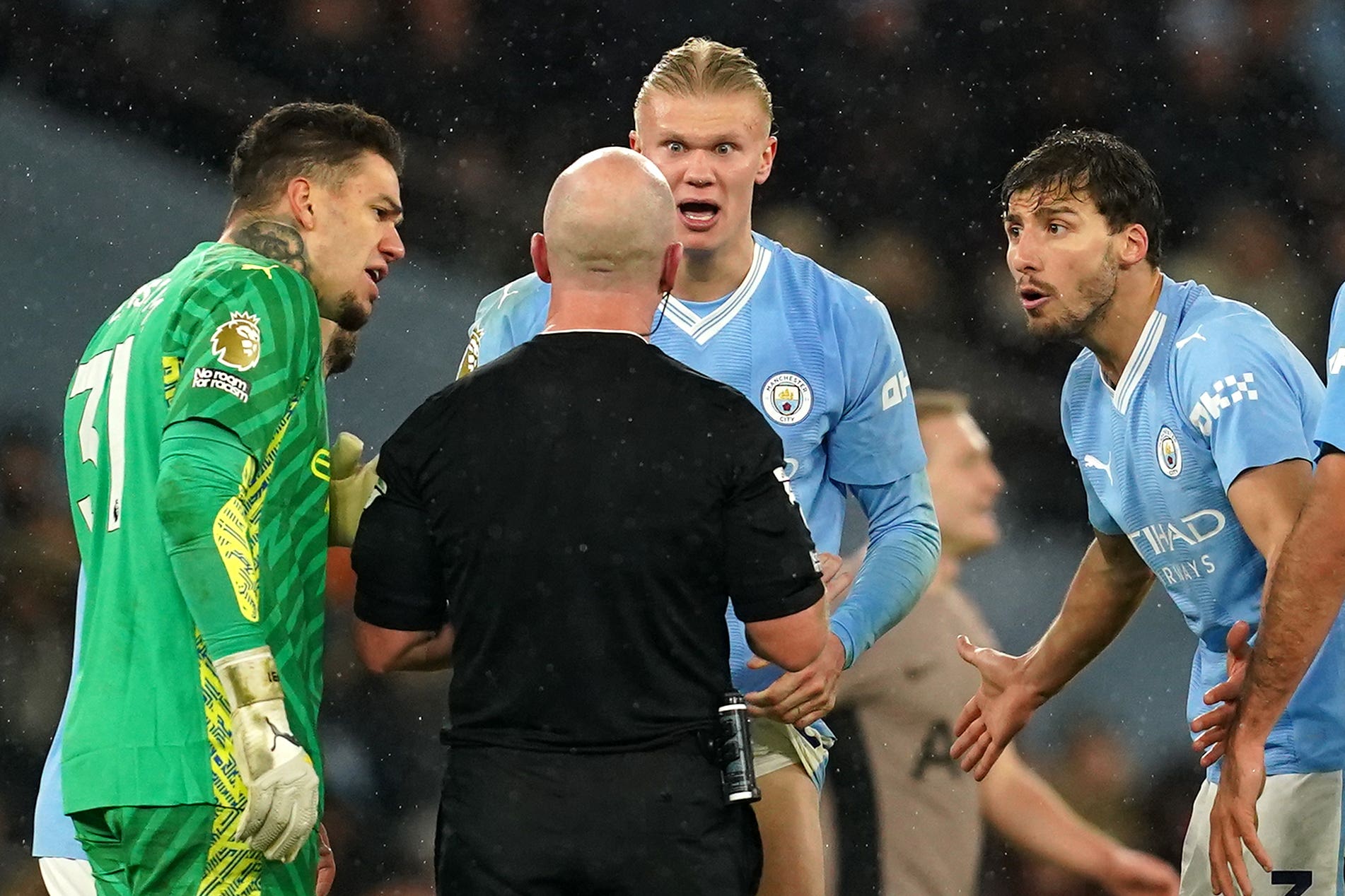 Manchester City charged by FA after players surround referee against Spurs  | The Independent
