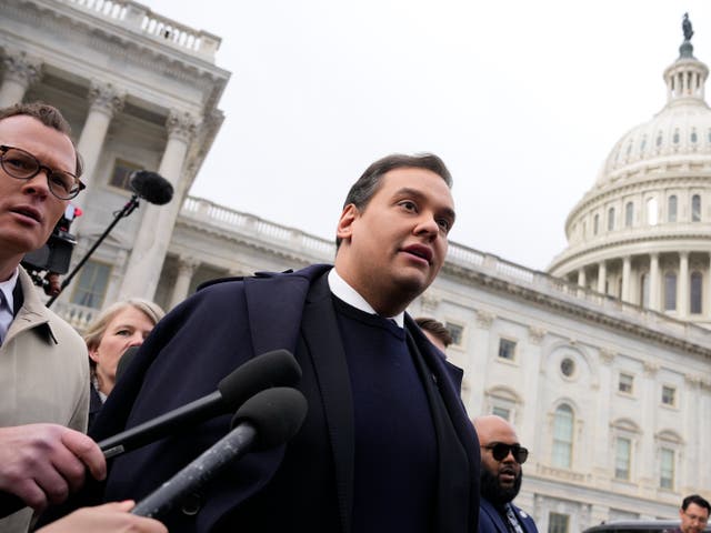 <p>Rep. George Santos (R-NY) is surrounded by journalists as he leaves the U.S. Capitol after his fellow members of Congress voted to expel him from the House of Representatives on 1 December 2023 in Washington, DC. </p>