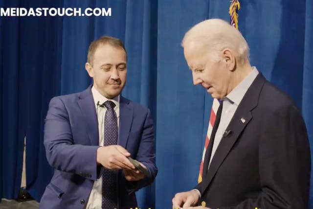 <p>Joe Biden laughs as he is shown a video of Lauren Boebert shouting about his Inflation Reduction Act</p>