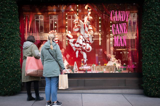 Shoppers on Oxford Street, central London, as the Christmas shopping period begins for retailers (James Manning/PA)