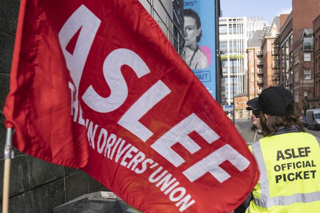 Members of the Aslef union on a picket line ahead of continuing strikes (Danny Lawson/PA)