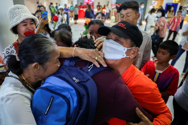 <p>Natthaporn Onkaew, 26, embraces his family as he arrives back home after being held for nearly two months when he was taken hostage by Hamas in Gaza</p>