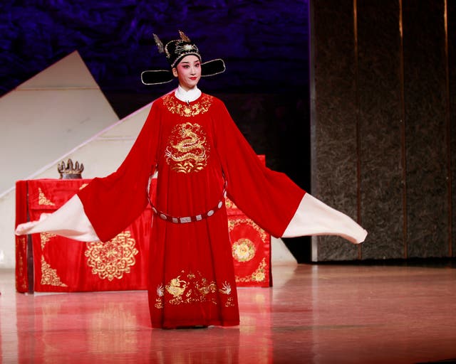 <p>A Huangmei Opera performer on stage at a theatre in Anqing, Anhui province</p>