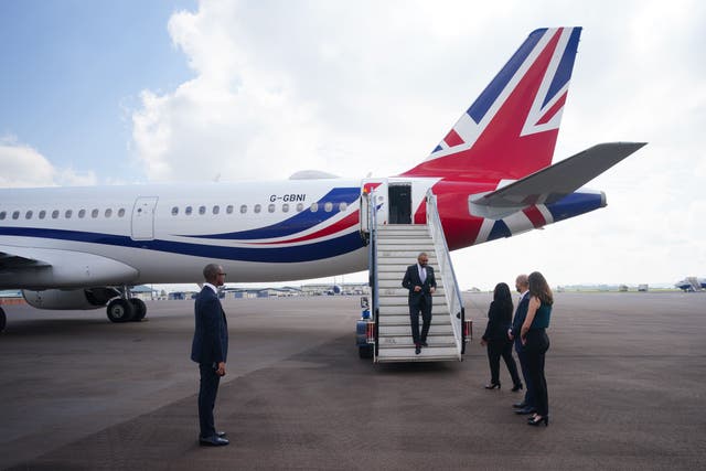 Home Secretary James Cleverly arrives at Kigali International Airport (Ben Birchall/PA)