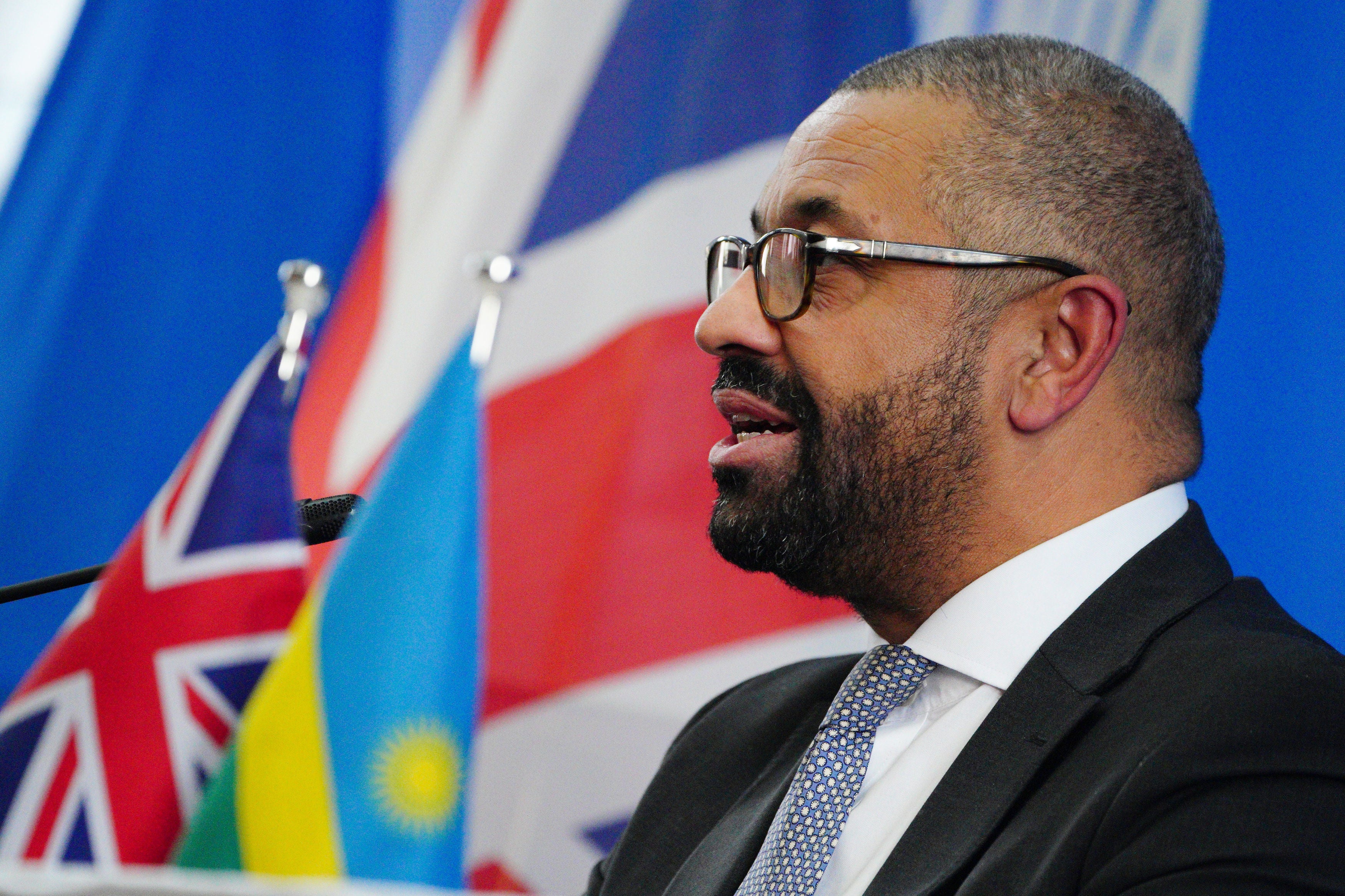 James Cleverly at a press conference in Rwanda