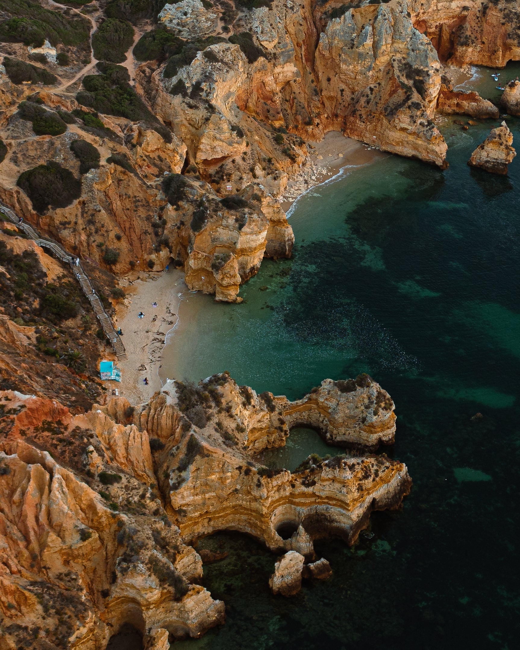 Take a detour to the sheltered, scenic surrounds of Camilo Beach, accessible via a wooden staircase