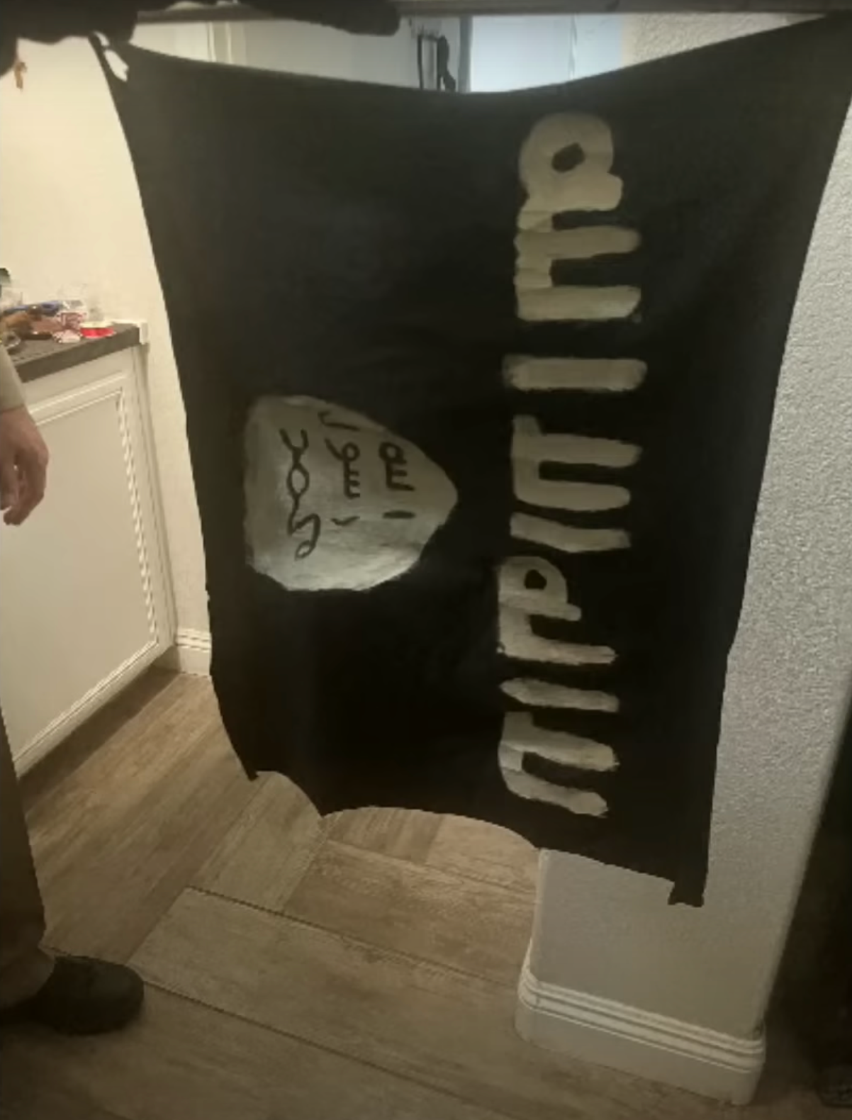 A handmade Isis flag recovered at the home of a teenager in Las Vegas