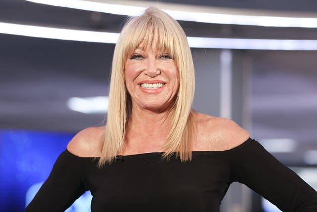 <p>Suzanne Somers’ husband reveals why she was buried in a pair of Timberland boots</p>
