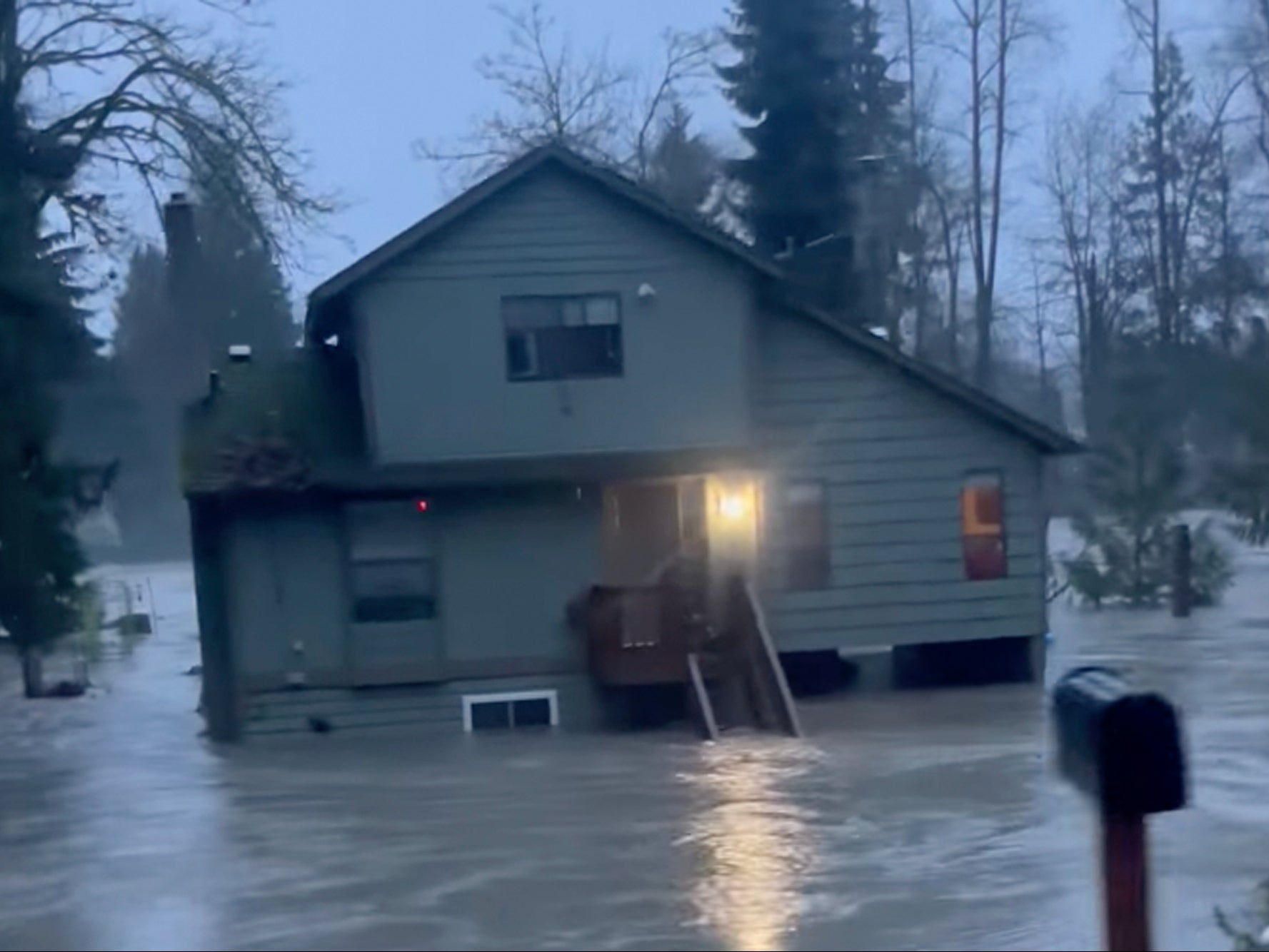 <p>A house inundated by flood waters in Granite Falls, Washington, on Tuesday 5 December 2023</p>