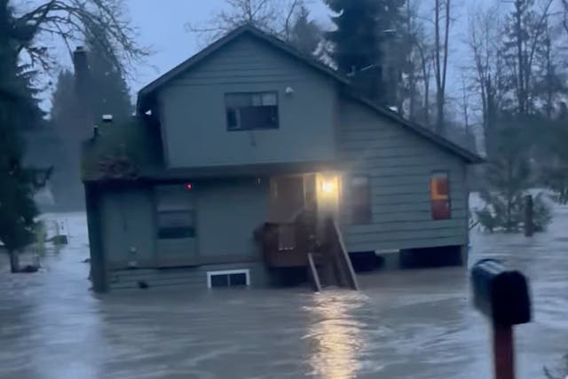<p>A house inundated by flood waters in Granite Falls, Washington, on Tuesday 5 December 2023</p>