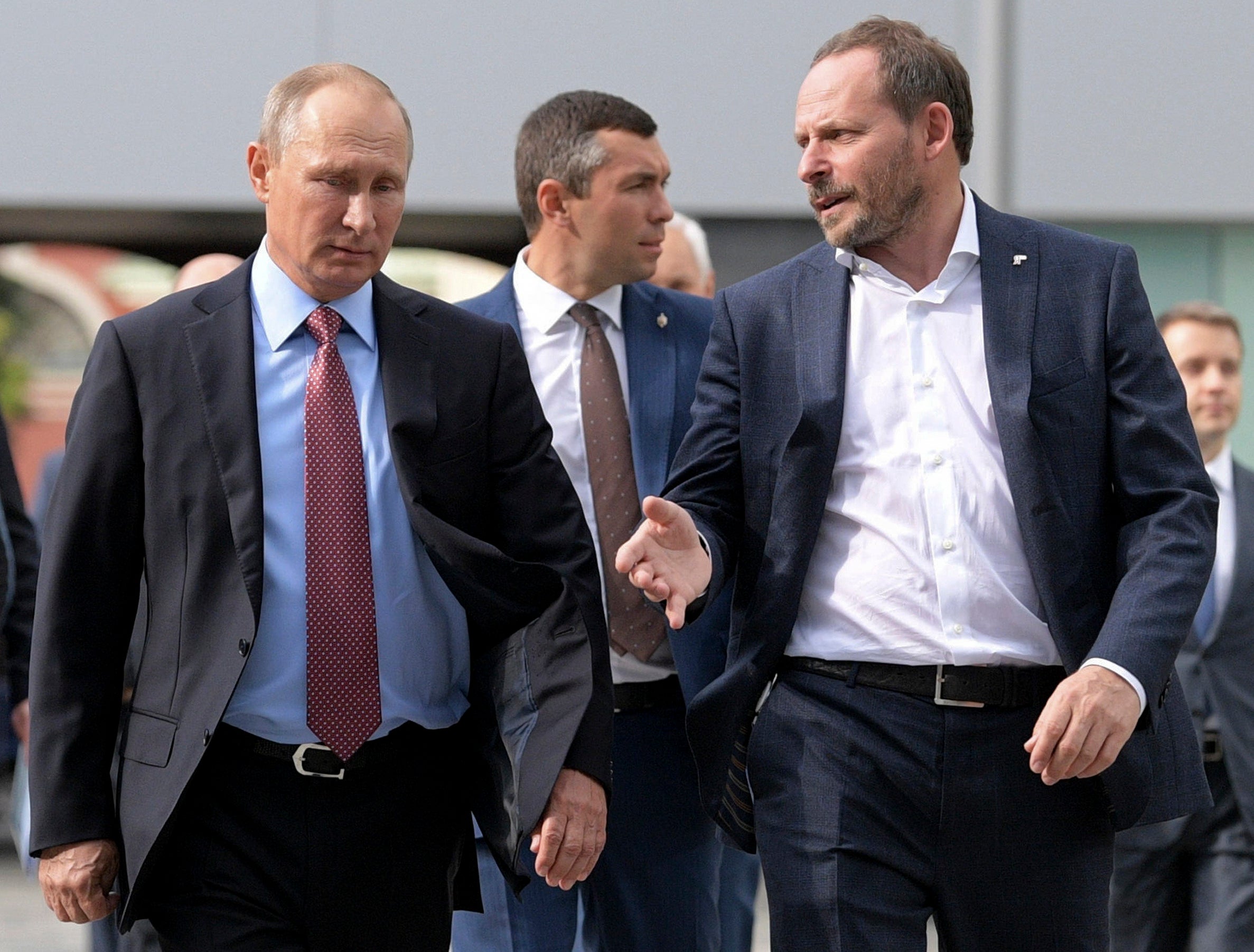 In this file photo taken on Sept. 21, 2017, Russian President Vladimir Putin, left, listens to Yandex CEO