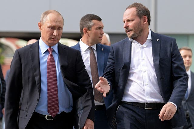 <p>In this file photo taken on Sept. 21, 2017, Russian President Vladimir Putin, left, listens to Yandex CEO </p>