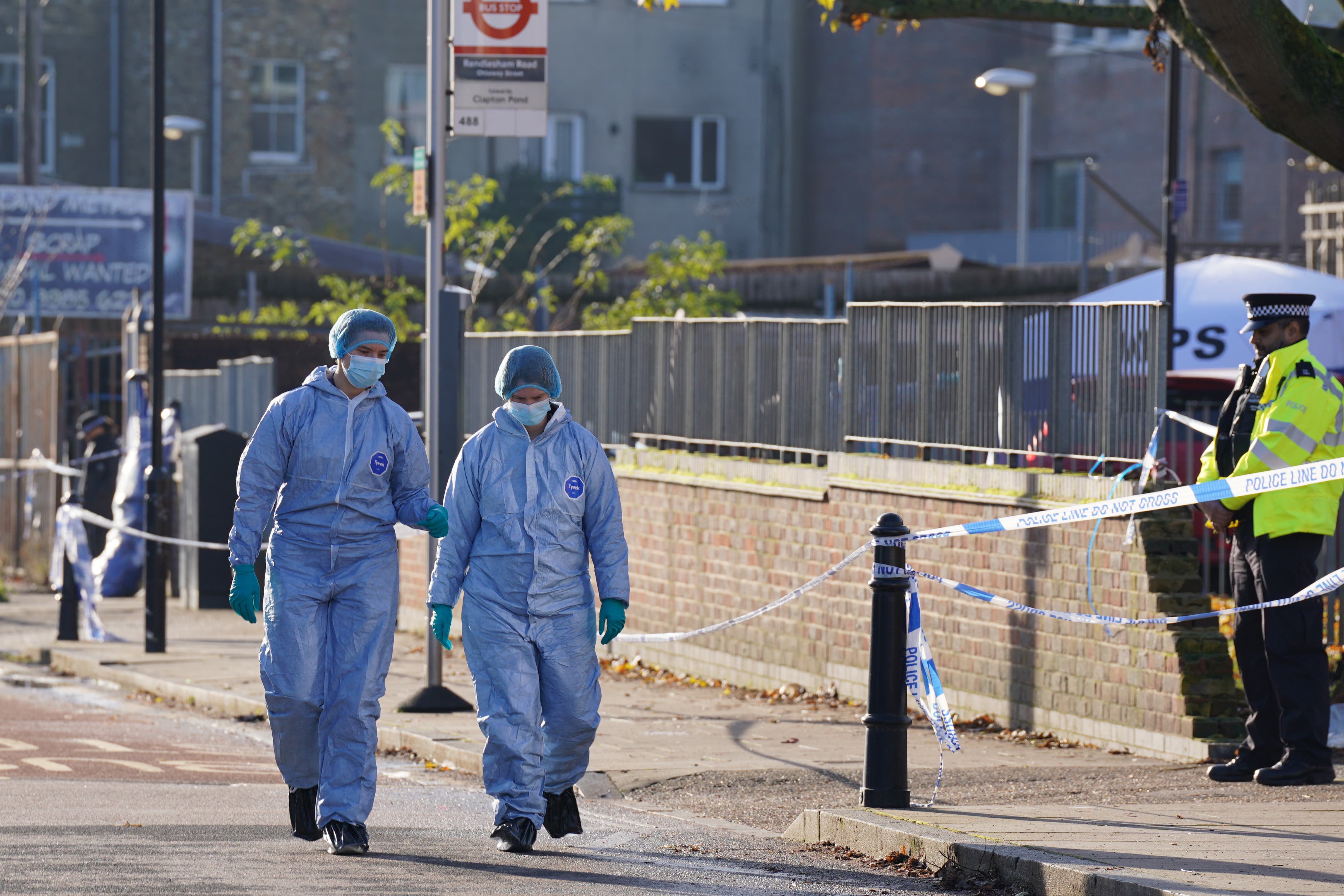 Forensics teams joined Met officers at the scene (Lucy North/PA)