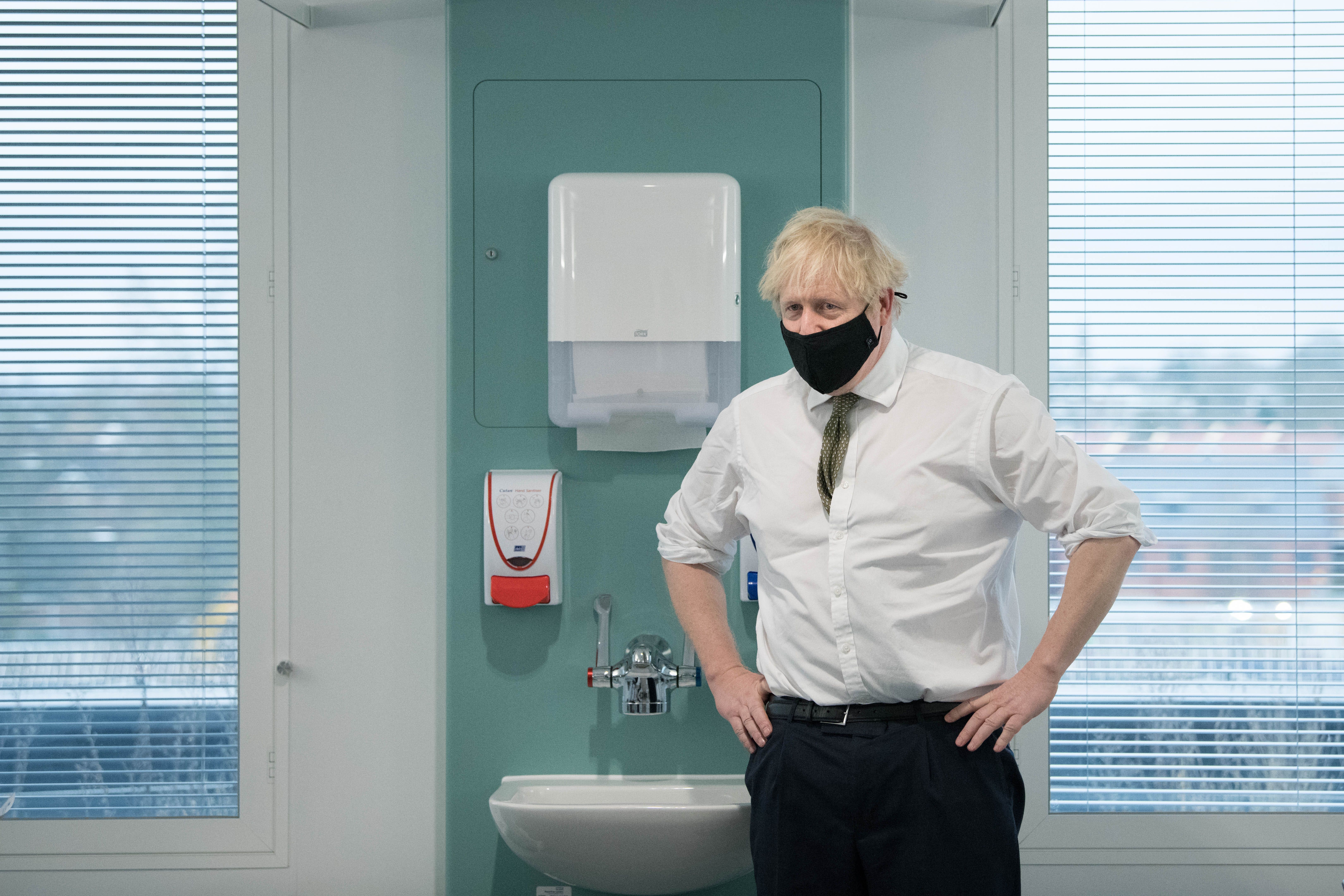 <p>Boris Johnson during a visit to a hospital during the pandemic   </p>
