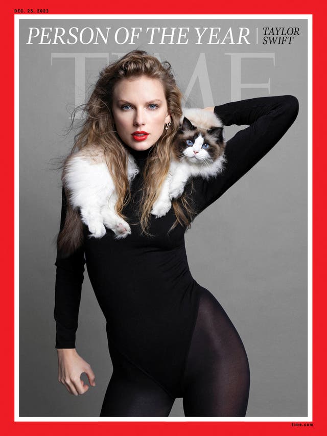 <p>Taylor Swift, with one of her three cats, Benjamin Button, on the cover of ‘Time’ magazine </p>