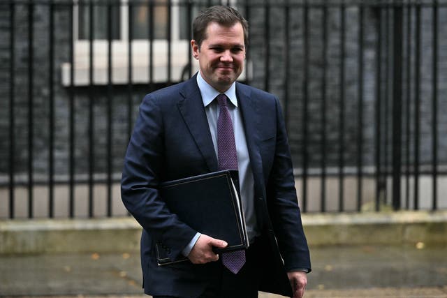 <p>Robert Jenrick, who has quit as immigration minister, in Downing Street </p>