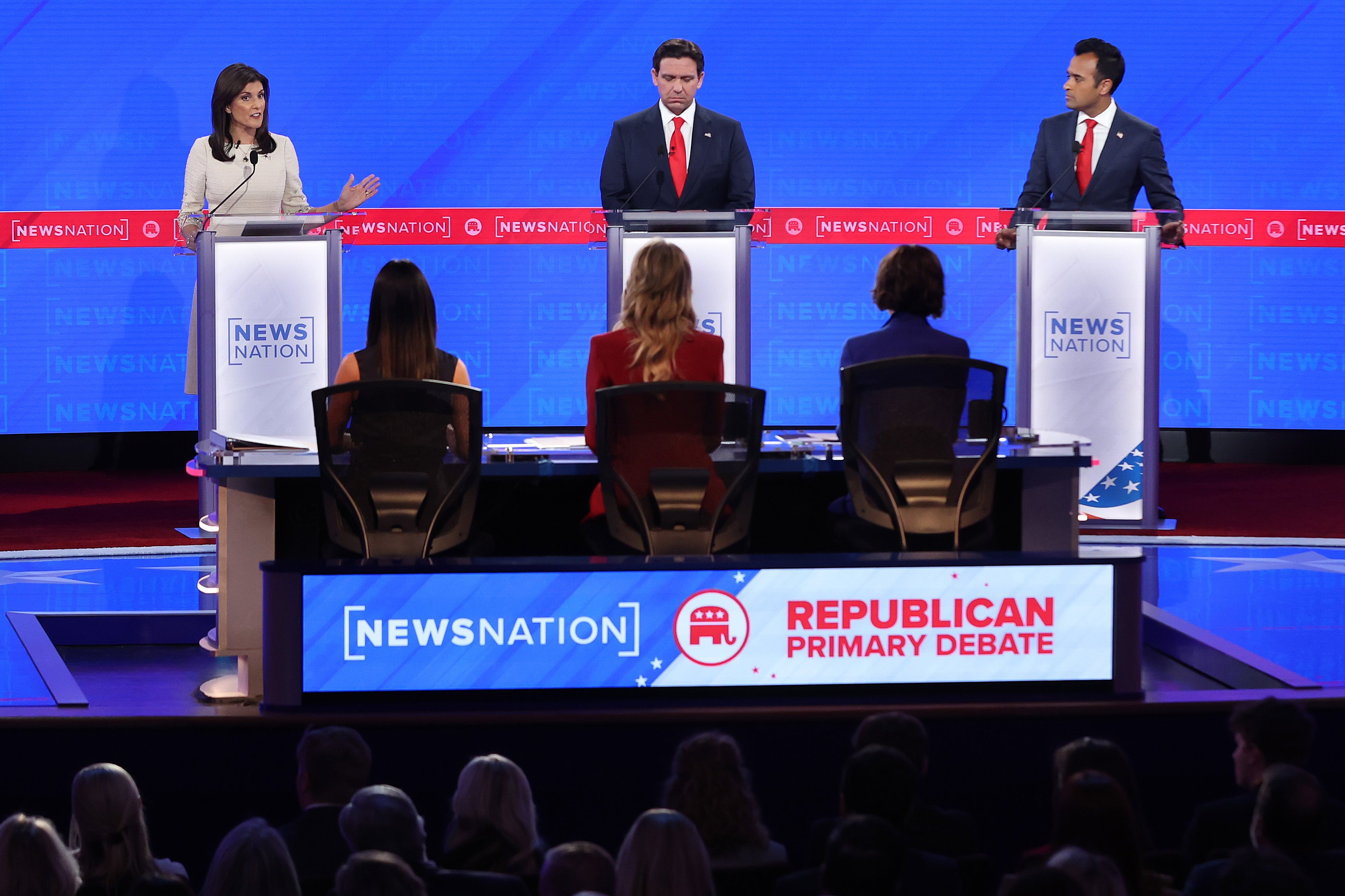 Republican presidential candidates (L-R) former U.N. Ambassador Nikki Haley, Florida Gov. Ron DeSantis and Vivek Ramaswamy participate in the NewsNation Republican Presidential Primary Debate at the University of Alabama Moody Music Hall on December 6, 2023 in Tuscaloosa, Alabama