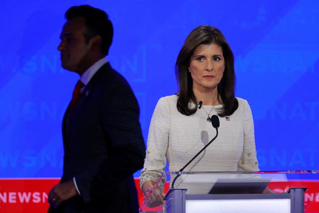 Republican presidential candidate and former U.S. Ambassador to the United Nations Nikki Haley looks on as fellow candidate businessman Vivek Ramaswamy passes by, during a break at the fourth Republican candidates' U.S. presidential debate of the 2024 U.S. presidential campaign at the University of Alabama in Tuscaloosa, Alabama