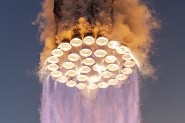 <p>The 33 Raptor engines of SpaceX’s Starship rocket during a test launch on 18 November 2023</p>