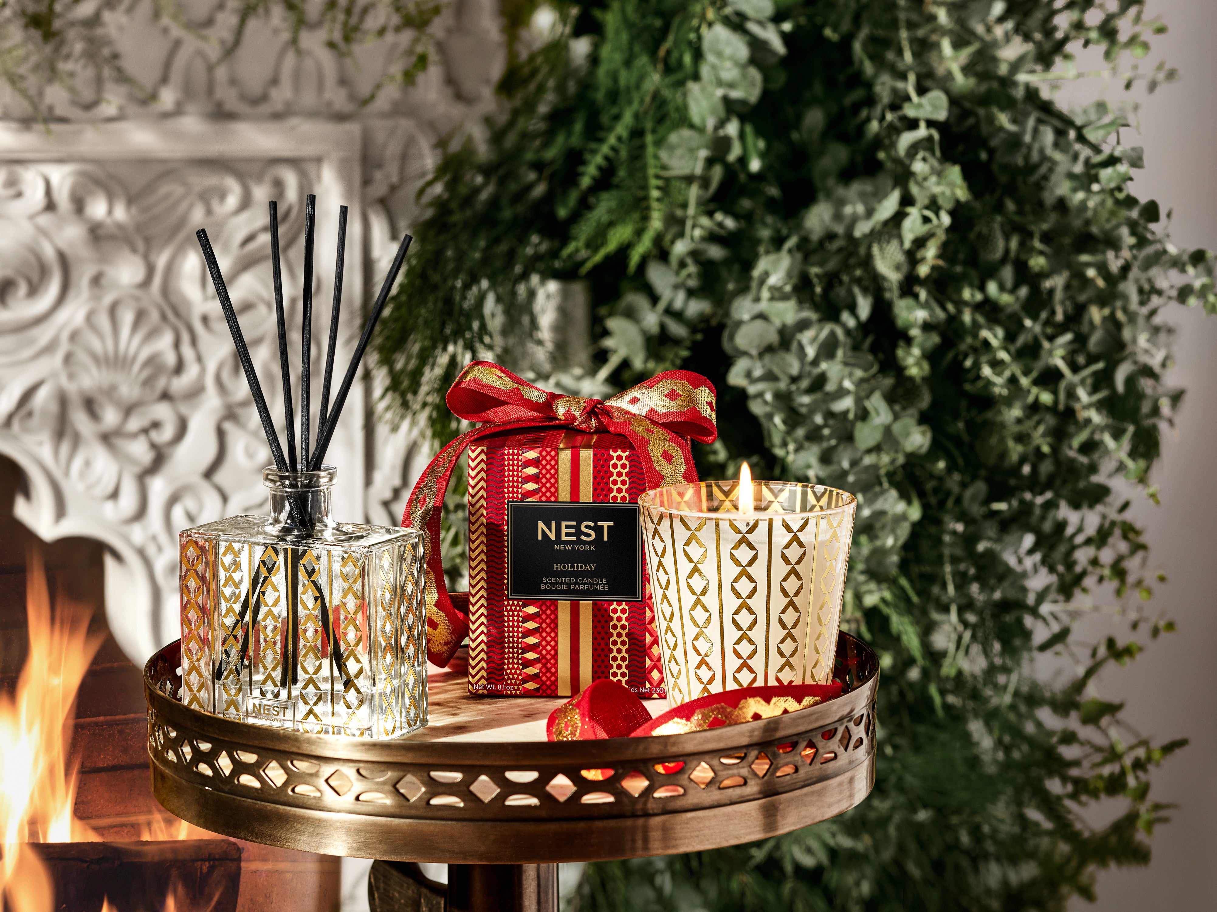 Nest ‘Holiday’ Candle gives off whiffs of pomegranate, mandarin orange, pine, cloves, and cinnamon
