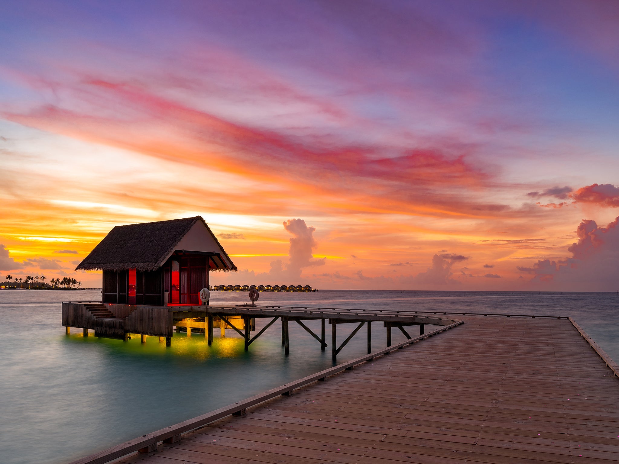 Maldivian sunsets can be enjoyed from the main bar